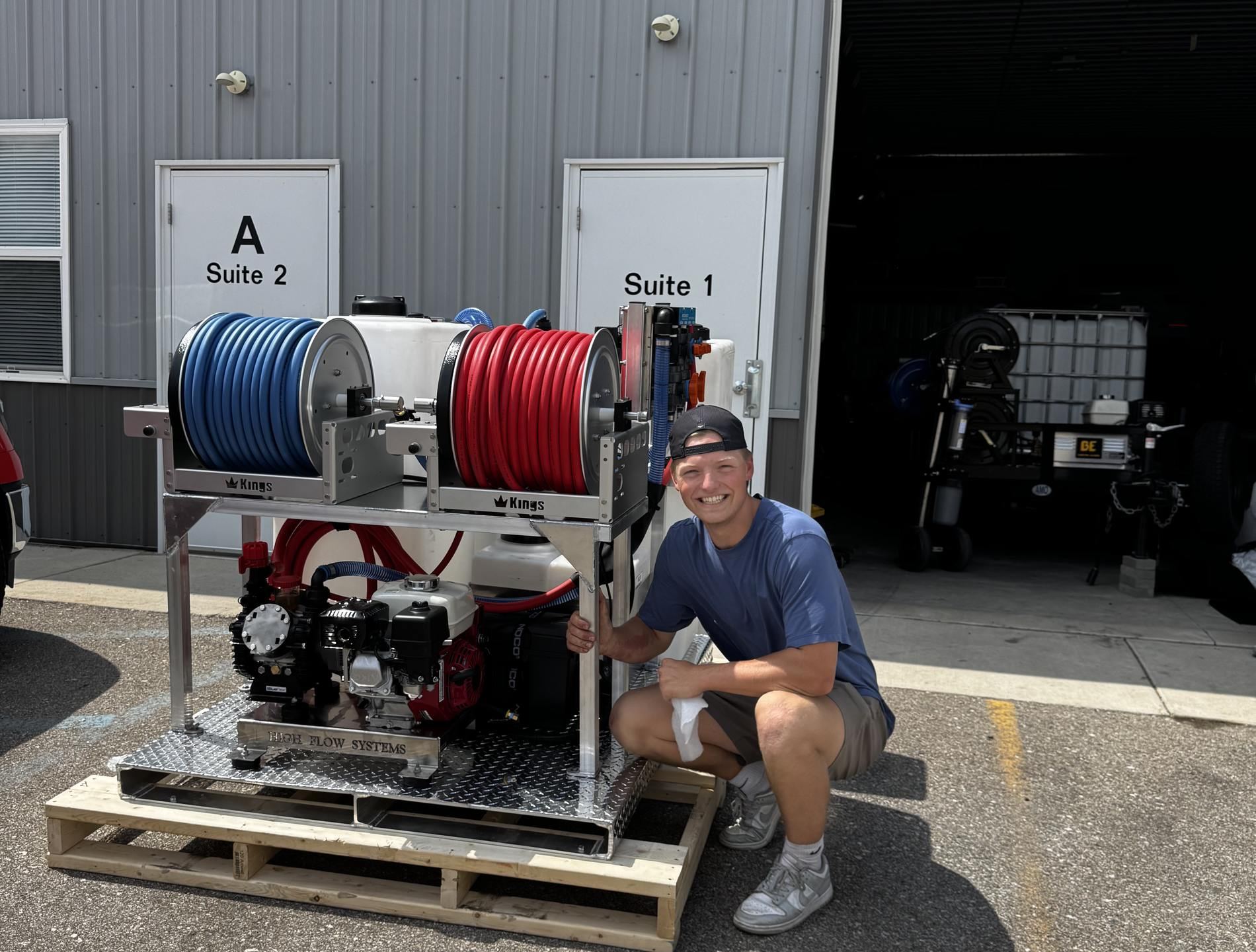 Nolan Campbell, owner of 323 Cleaning Solutions, beside the pressure-washing rig he built.