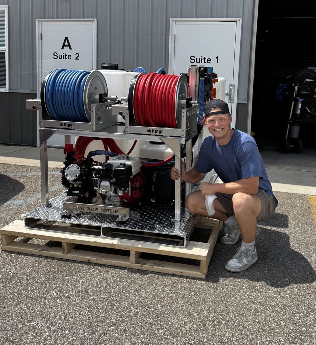 Nolan Campbell beside the pressure-washing rig he built.