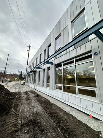 Street-level glazing running the length of a commercial frontage.